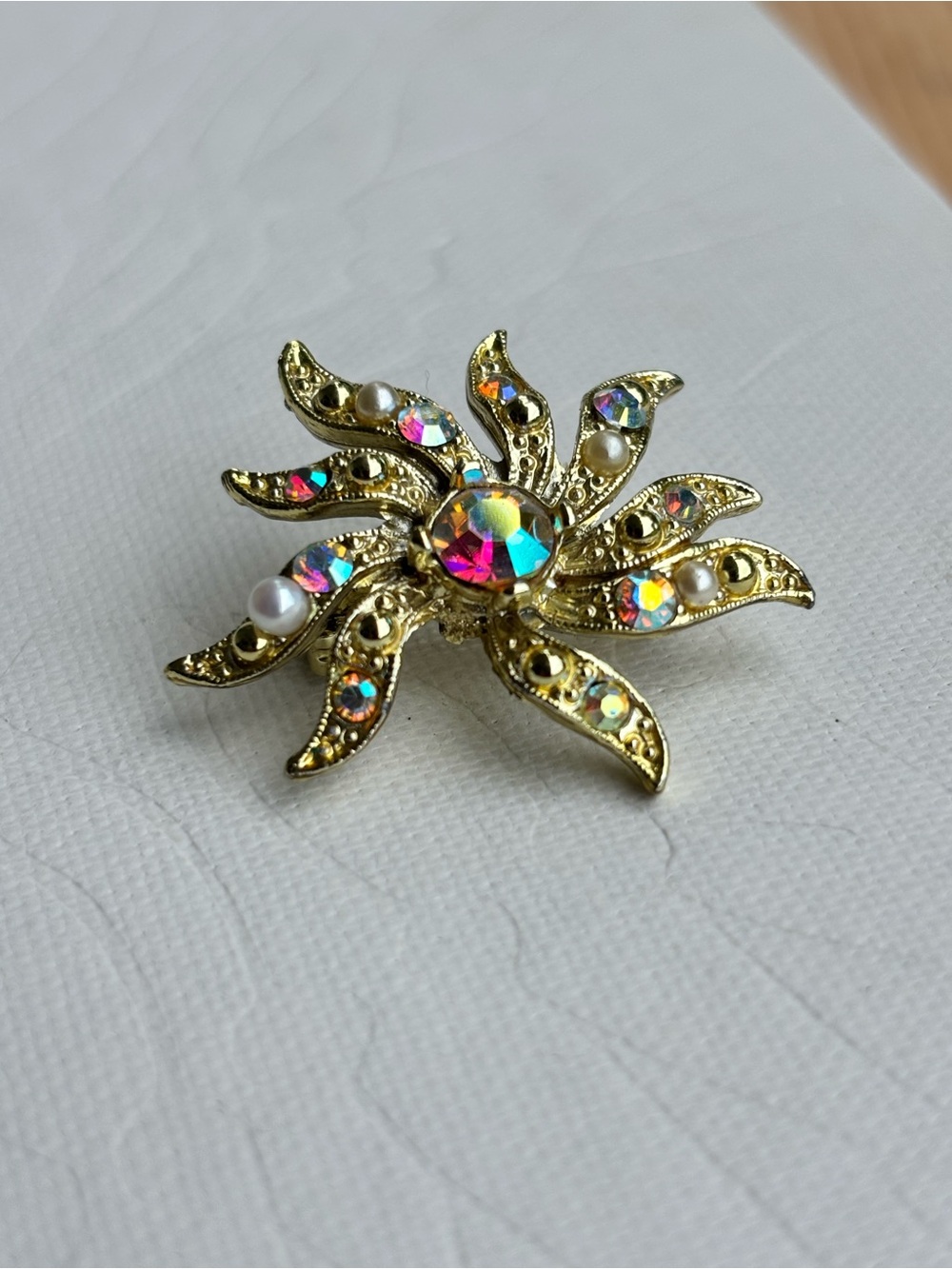 Aurora Borealis Crystal Starburst Pin Brooch - Gold Tone